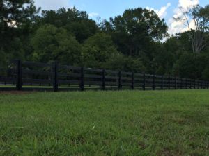 Black double post farm fence